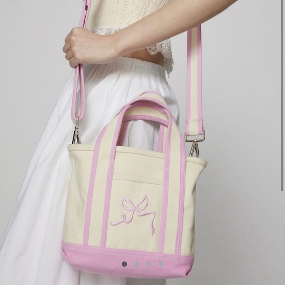 Urban Outfitters Handbags - Urban Outfitters Bow Canvas Crossbody Bag